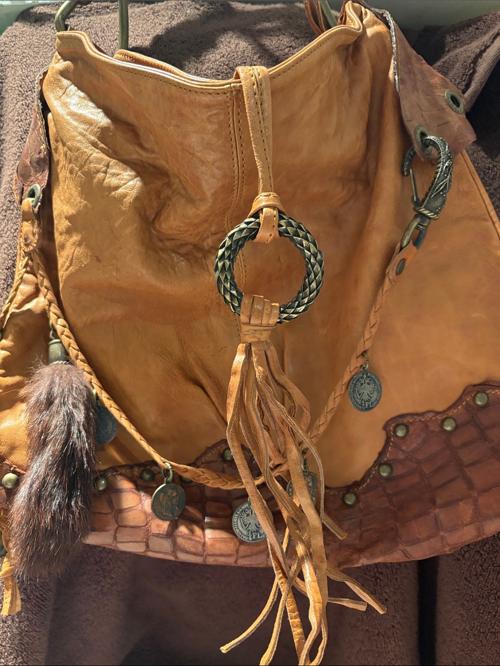 Tan Leather Hobo Bag with Braided Tassel Accent